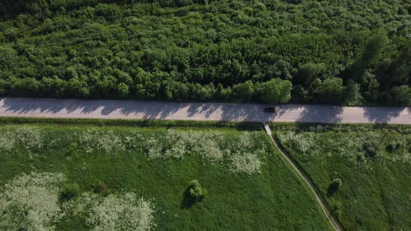 Flying Over the Road in the Field