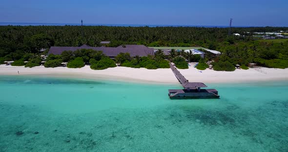 Luxury aerial clean view of a white paradise beach and aqua blue water background in vibrant 