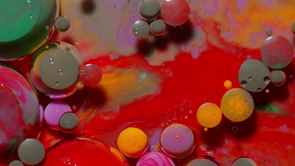 Bubbles Float in Liquid Paint Mixing Ink Oil and Milk Abstract Multicolor Hypnotic Painting