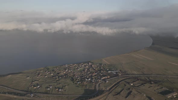 Aerial view of Lake Paravani and the village Poka. Georgia