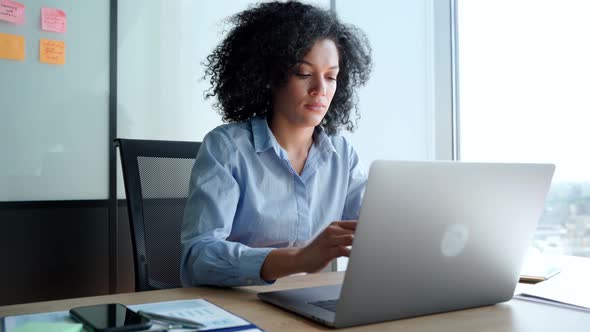 Concentrated African American Businesswoman Working Typing Using Pc Laptop