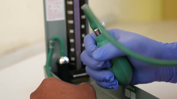 Macro shot of pressing cuff of blood pressure measuring machine