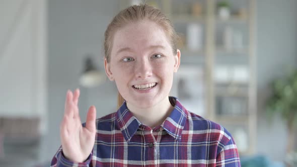 Close Up of Young Woman Waving Good Bye