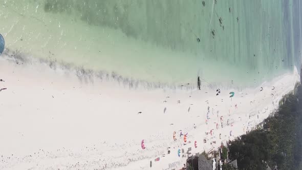 Vertical Video Boats in the Ocean Near the Coast of Zanzibar Tanzania Aerial View