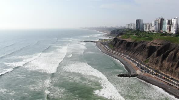 Static 4k aerial video looking over the magnificent Pacific west coast in Miraflores, Lima, Peru. La