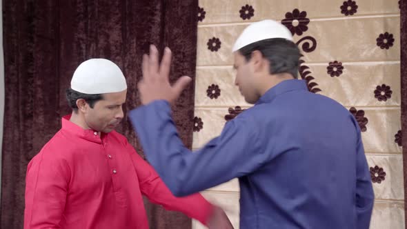 Two Muslim man fighting