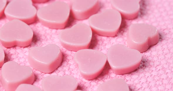 Pink chocolate on pink background