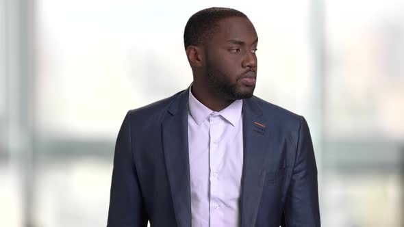 Thoughtful Black Businessman in Suit