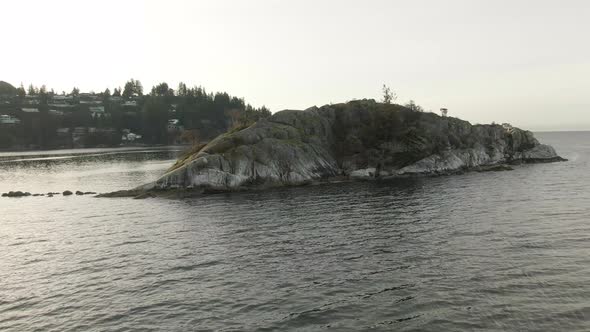 Aerial Panoramic View of Rocky Island on the Pacific Ocean West Coast