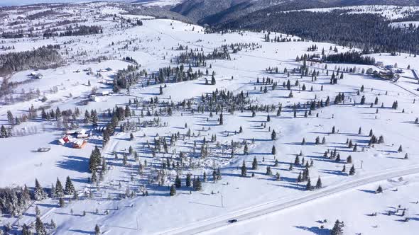 Flying Above Snowy Mountains