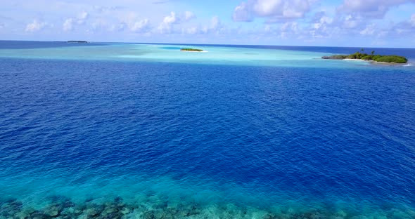 Beautiful flying island view of a paradise sunny white sand beach and blue sea background 