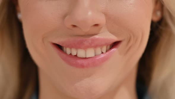 Close Up of Smiling Mouth of Young Woman
