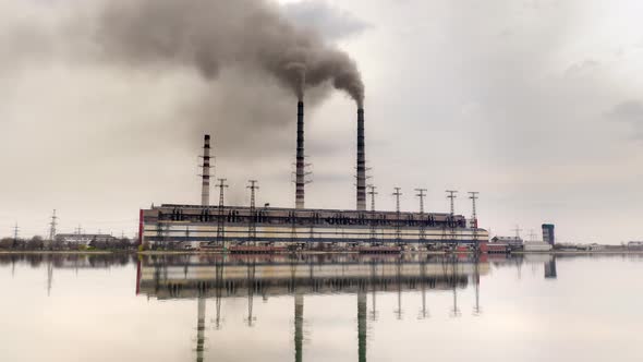 Panoramic View of the Industrial Site Surrounded with the Waters of the Pond