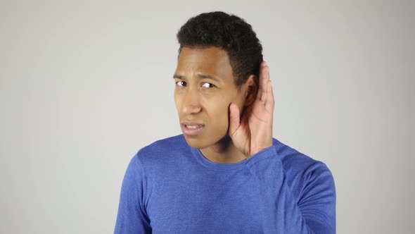 African Man Trying to Listen White Background