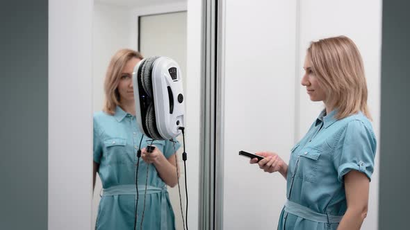 A Beautiful Housewife Installs a Cleaner Robot