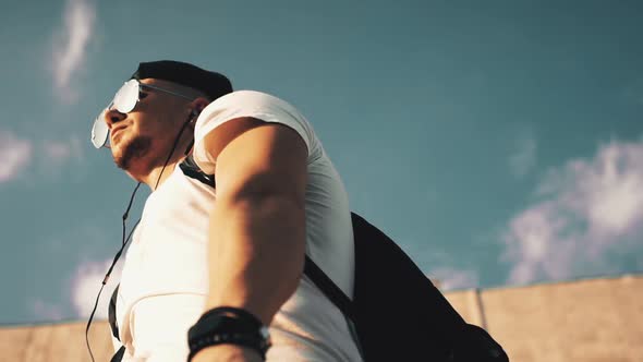 Young Man Dancing with Headphones