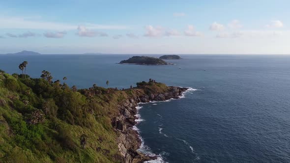 Beautiful Tropical Rocky Cape with Islands, Clouds and Waves: Phuket, Thailand's Promthep Cape