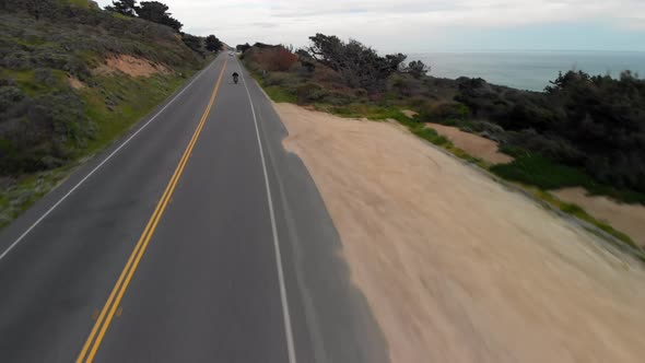 Aerial of Motorcyclist Riding on California Coast Highway One