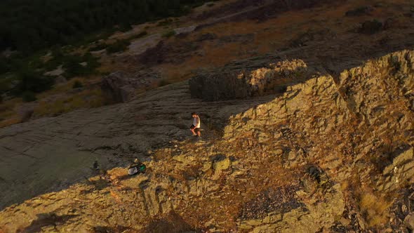 Man hiking on back of a mountain, Puerto de la Puebla, Spain