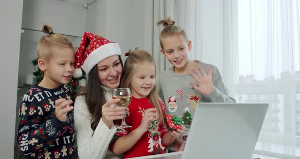 New Year Concept Mom Her Children Christmas Costumes Make Online Call Laptop