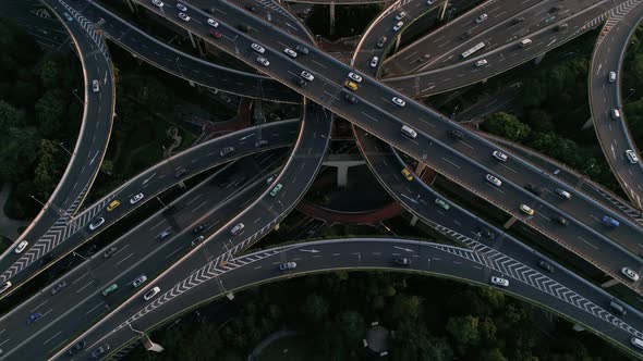 Aerial view of a busy road intersection in Shanghai at night, China.