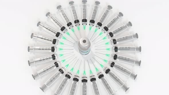 Glass Bottle with Hepatitis E Vaccine and Syringes alt