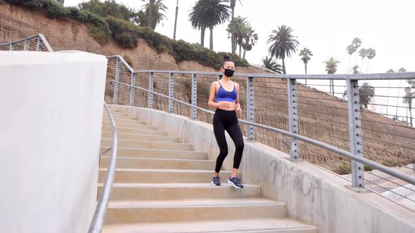 Athletic Asian woman going for her morning workout