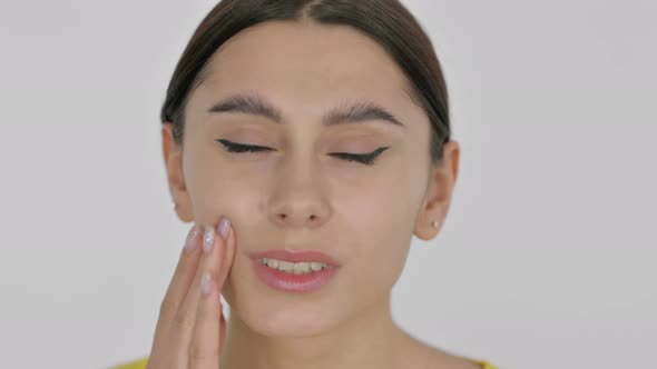 Face of Spanish Woman with Toothache