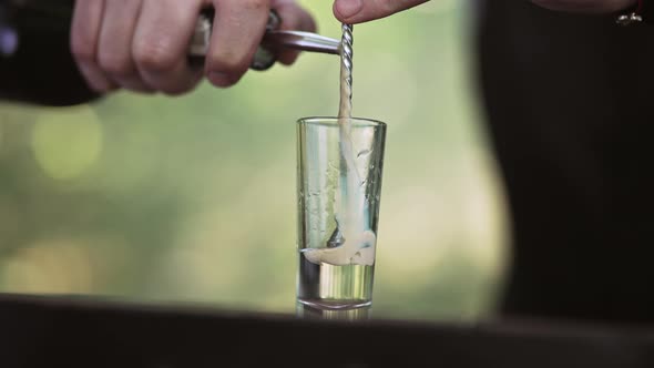 Bartender Making a Cocktail in the Mystical Forest