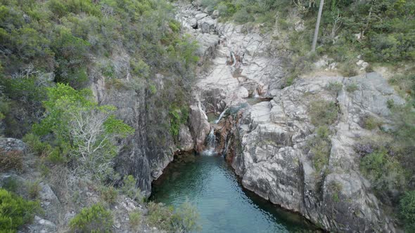 Aerial forward view over waterfall Portela Do Homem. National Park Peneda-Gerês, Portugal