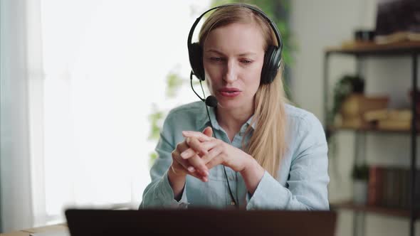 Woman in Headset Providing Consultation