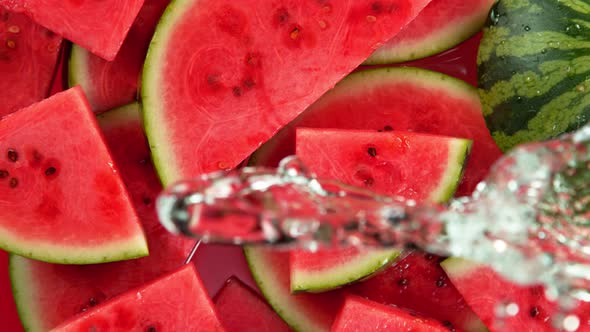 Super Slow Motion Shot of Splashing Water on Fresh Watermelon Slices at 1000Fps