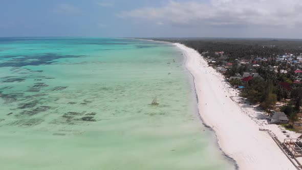 Ocean Coastline with Paradise Beach Hotels and Palm Trees Zanzibar Aerial View