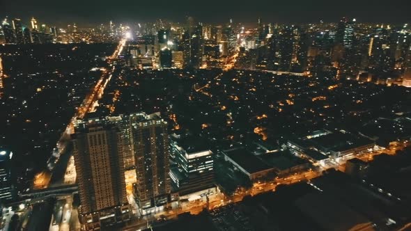 Slow Motion Illuminated Night Cityscape Panorama Aerial View