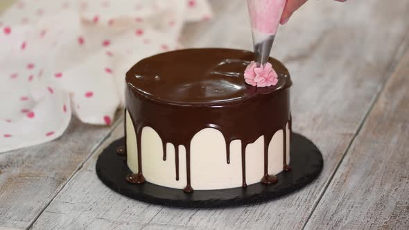 The Pastry Chef Prepares and Decorates the Cake at Home