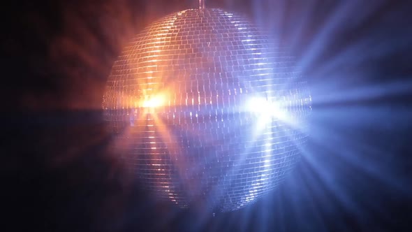 Disco Mirror Ball Reflect Very Bright Blue and Red Light