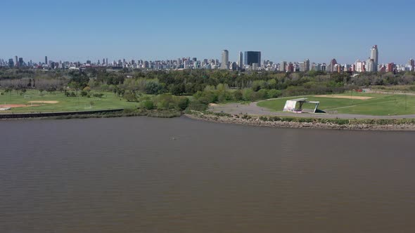 Aerial modern City warterfront forward move. North of Buenos Aires capital city from the river. Skyl