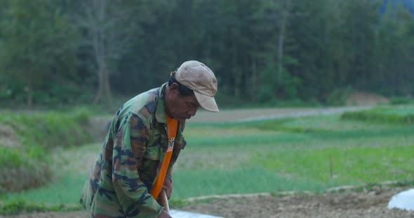 Man Digging Vegetable Garden Soil