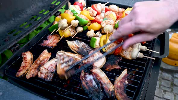 Pork, Fish And Chicken Skewers Sizzling On The Barbecue, Stock Footage By Brian Holm Nielsen