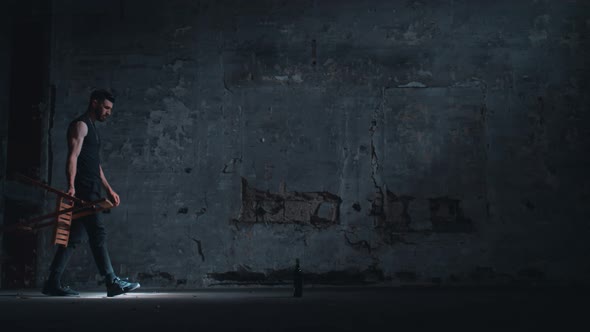 Man alone in a dark room