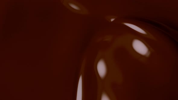 Super Slow Motion Shot of Swirling Chocolate Background at 1000Fps