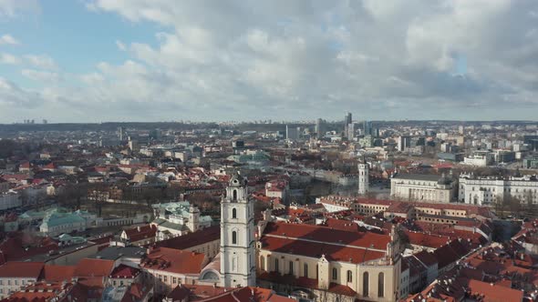 AERIAL: Vilnius Old Town City Buildings and Narrow Streets 