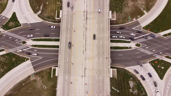 Vehicles Driving On The First Diverging Diamond Interchange At Oakland County In Michigan, USA. stat