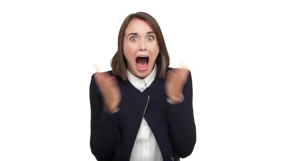 Slow Motion Portrait of Delighted Female Entrepreneur with Short Dark Hair Being Absolutely Thrilled