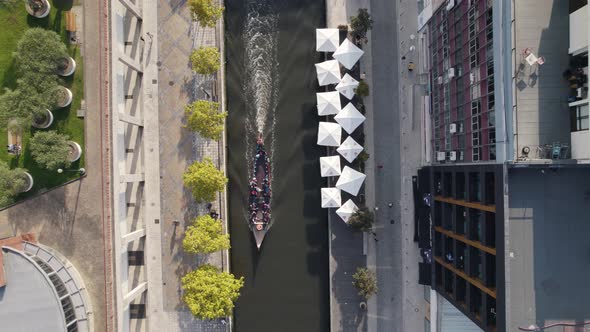 Aerial static top down view above narrow water canal in Aveiro, center of Portugal.