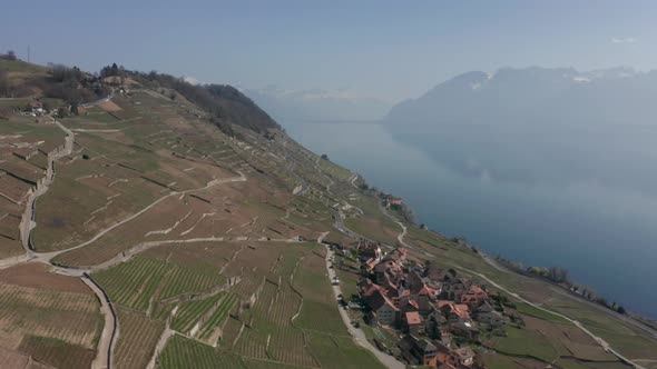 Aerial of beautiful farming town in Swiss countryside