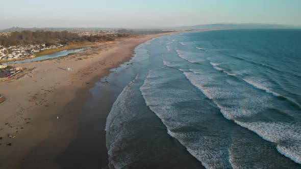 Pismo Beach High Altitude Waves Crashing on Beach with Drone