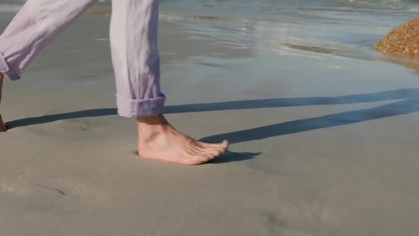 Man walking on beach