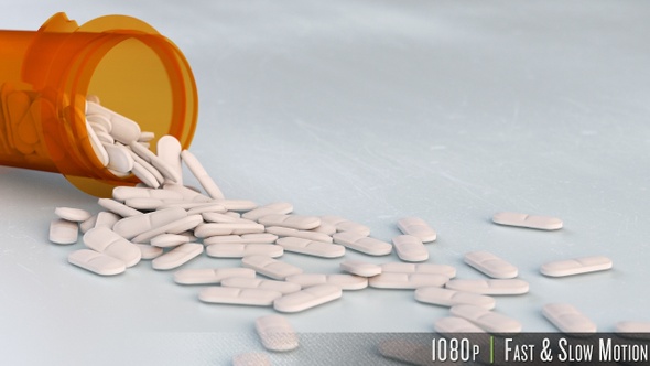 Pills Falling Out Of Prescription Pill Bottle