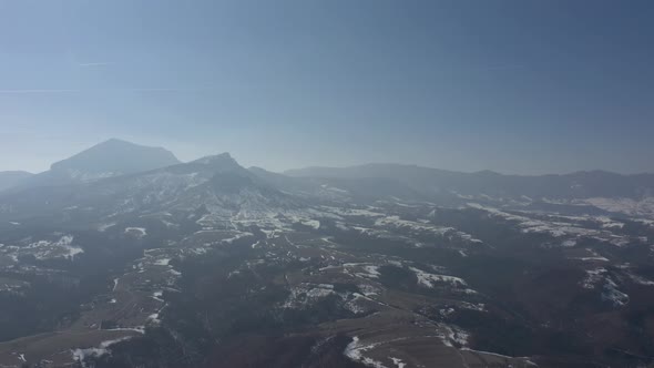 Stol and Veliki Krs mountains before sunset 4K drone video